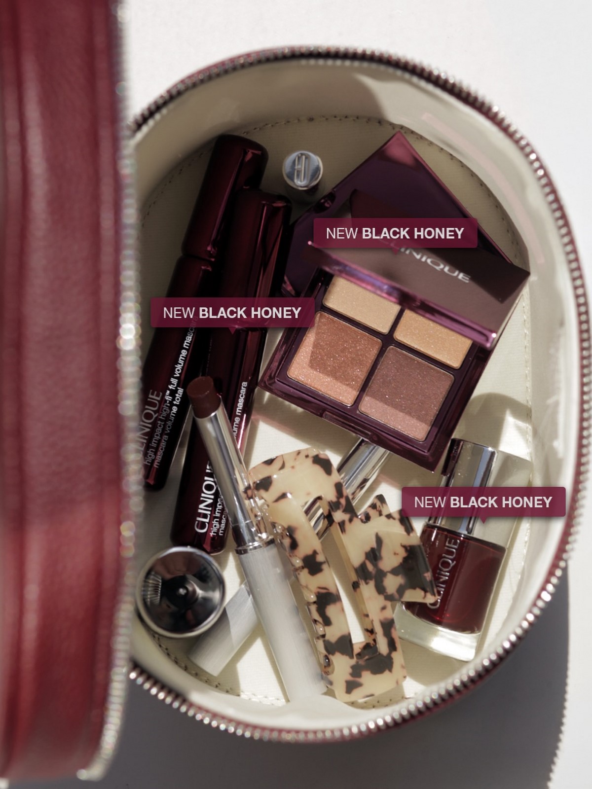 Лімітована колекція Clinique Black Honey у косметичці: лак для нігтів, палетка тіней, туш і Almost Lipstick